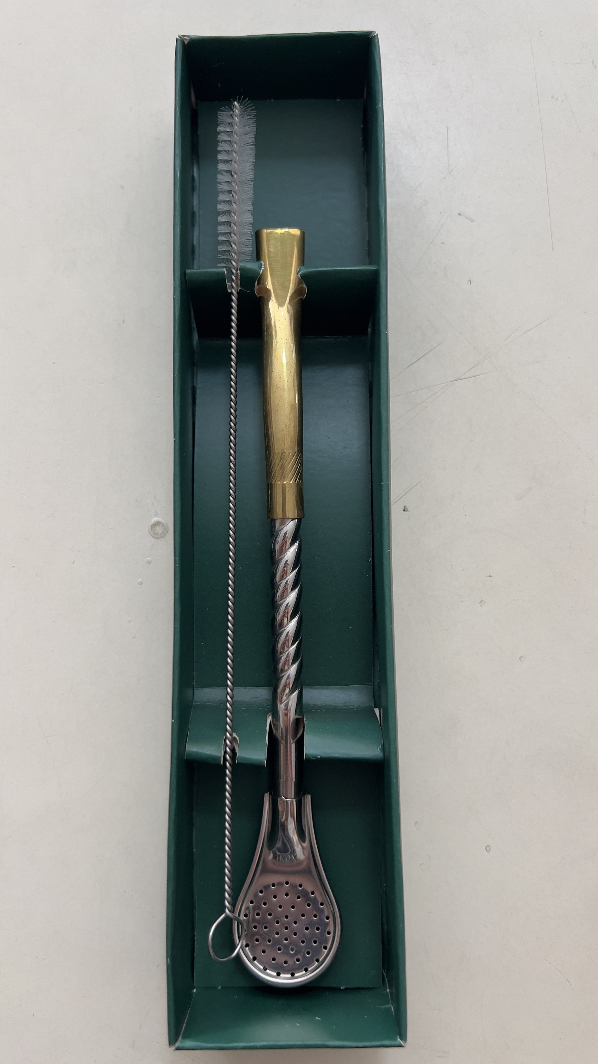 Bomba de inox dourada e prata