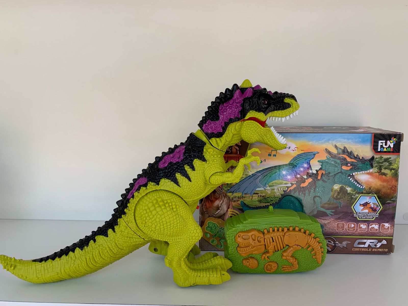 Brinquedo Dinossauro som e luz